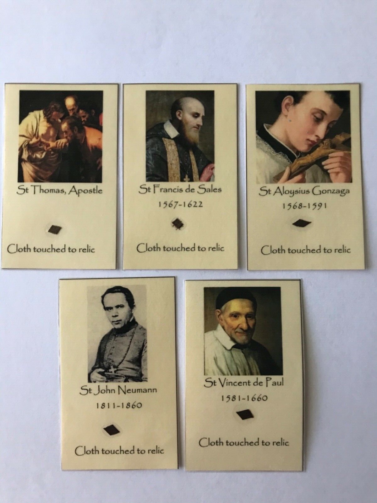 Catholic homemade relic holy card lot Saint Thomas St Francis de Sales Vincent
