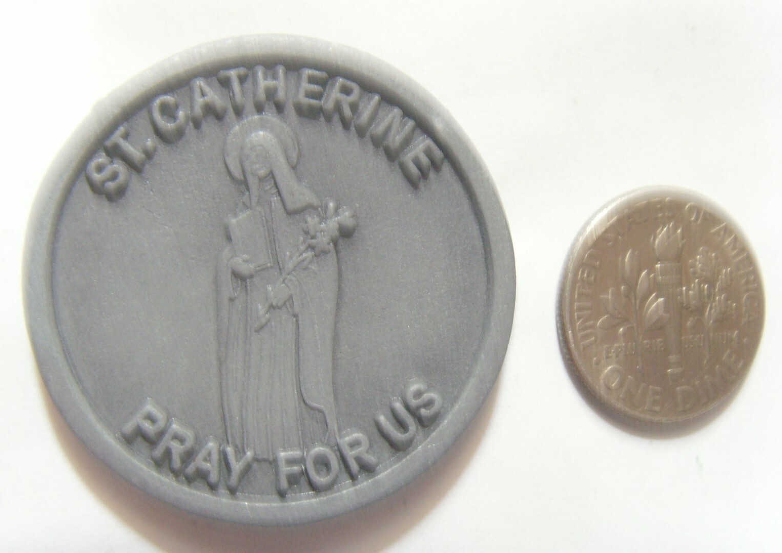 1960s vintage grey silver tone metal catholic St Catherine pocket token EL1076