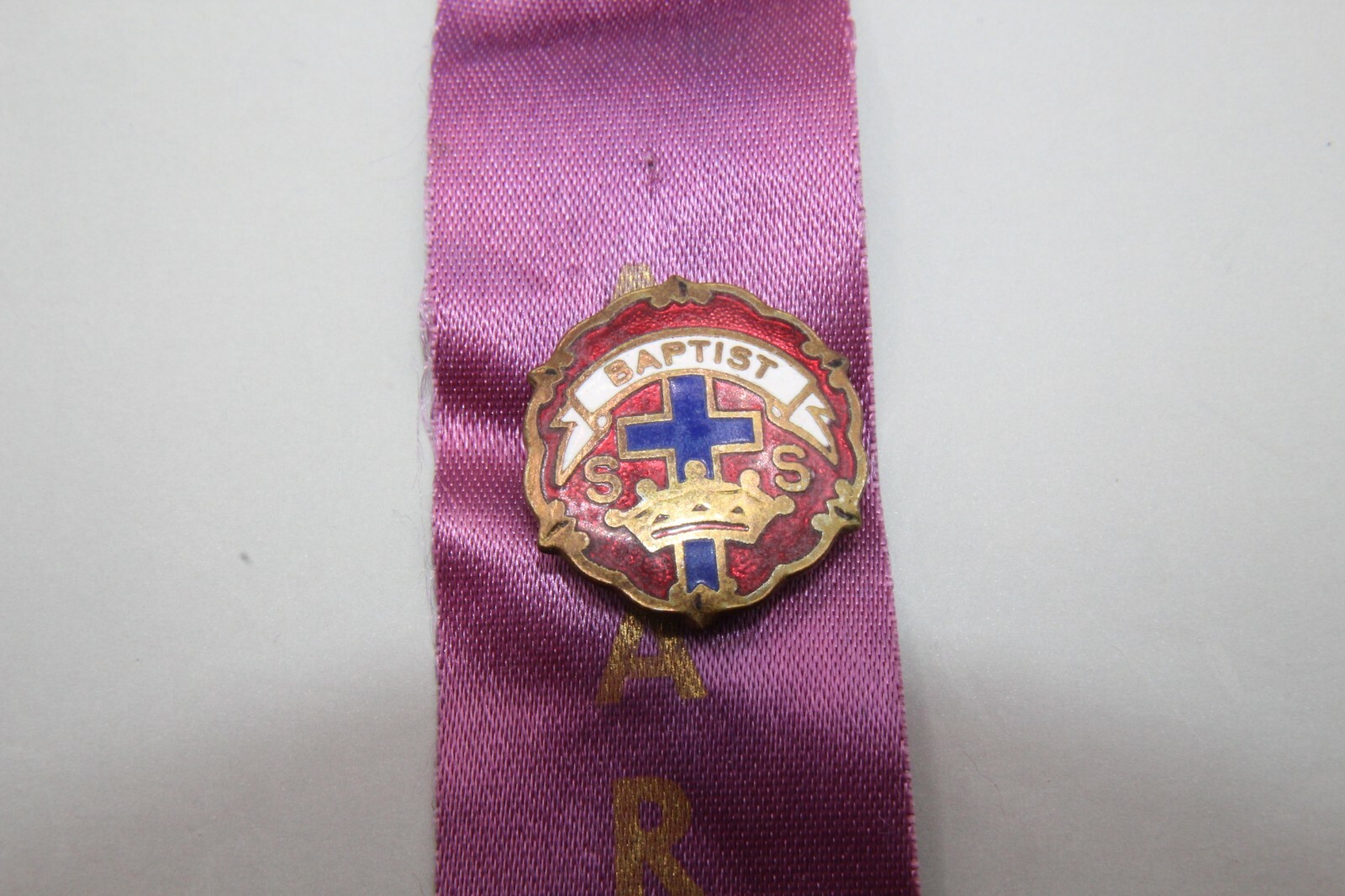 Award Ribbon with an Attached Multi-Colored Enameled Babtist Church Pin