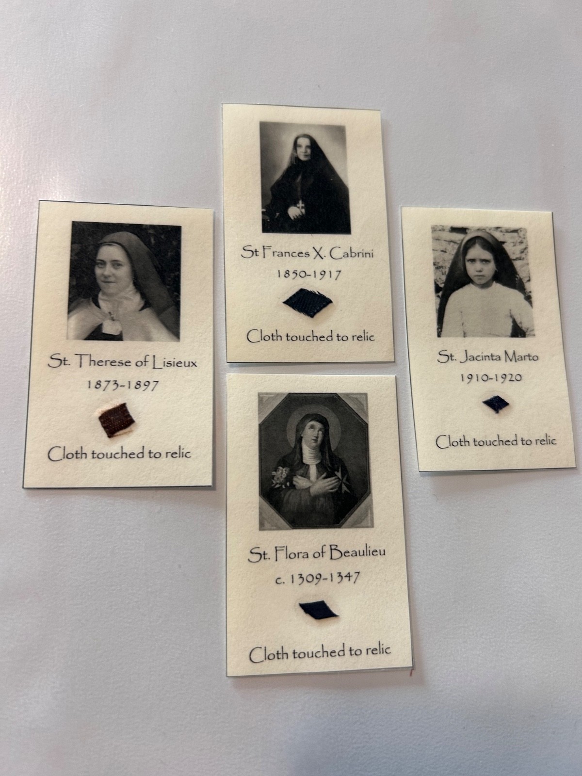 Catholic Saint homemade relic Holy card St Therese Frances Cabrini Jacinta Flora