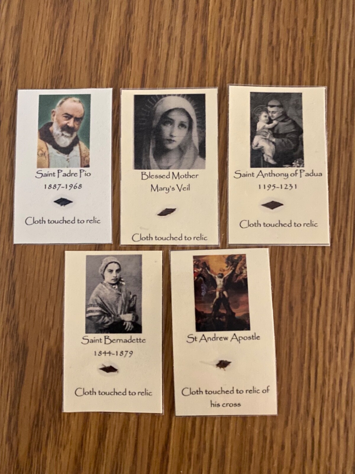 Catholic homemade relic holy card lot Saint Andrew St Pio Bernadette Anthony