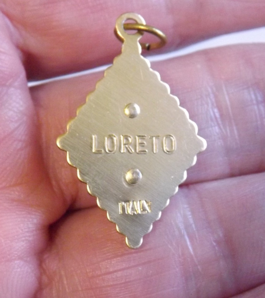Lightweight gold tone faux mop plastic Our Lady of Loreto pendant medal