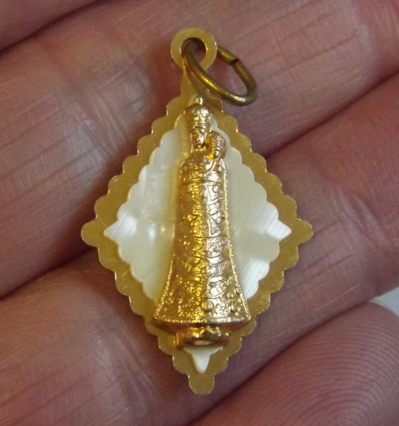 Lightweight gold tone faux mop plastic Our Lady of Loreto pendant medal