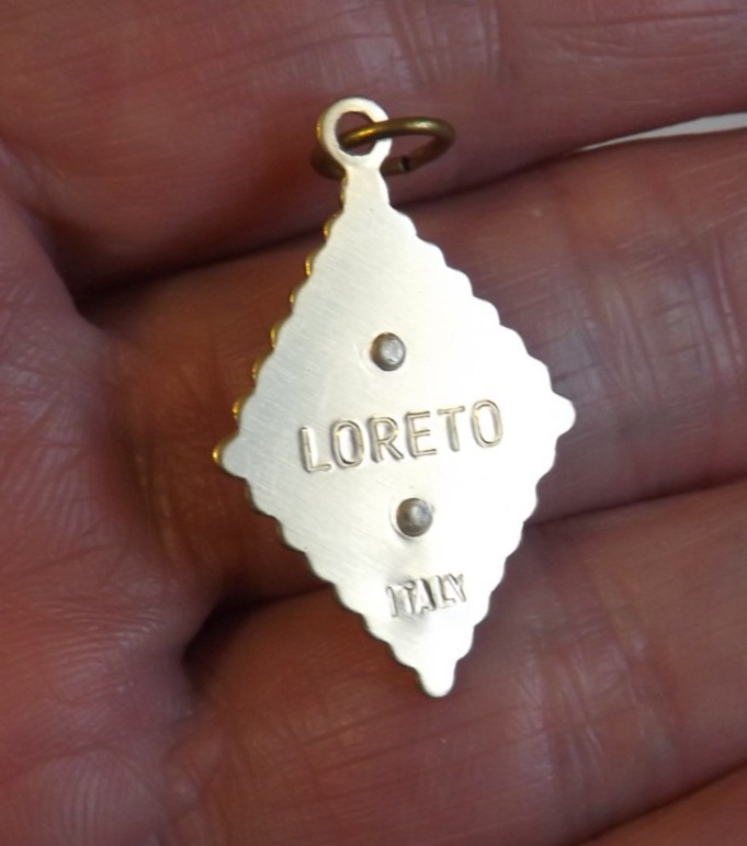 Lightweight gold tone faux mop plastic Our Lady of Loreto pendant medal