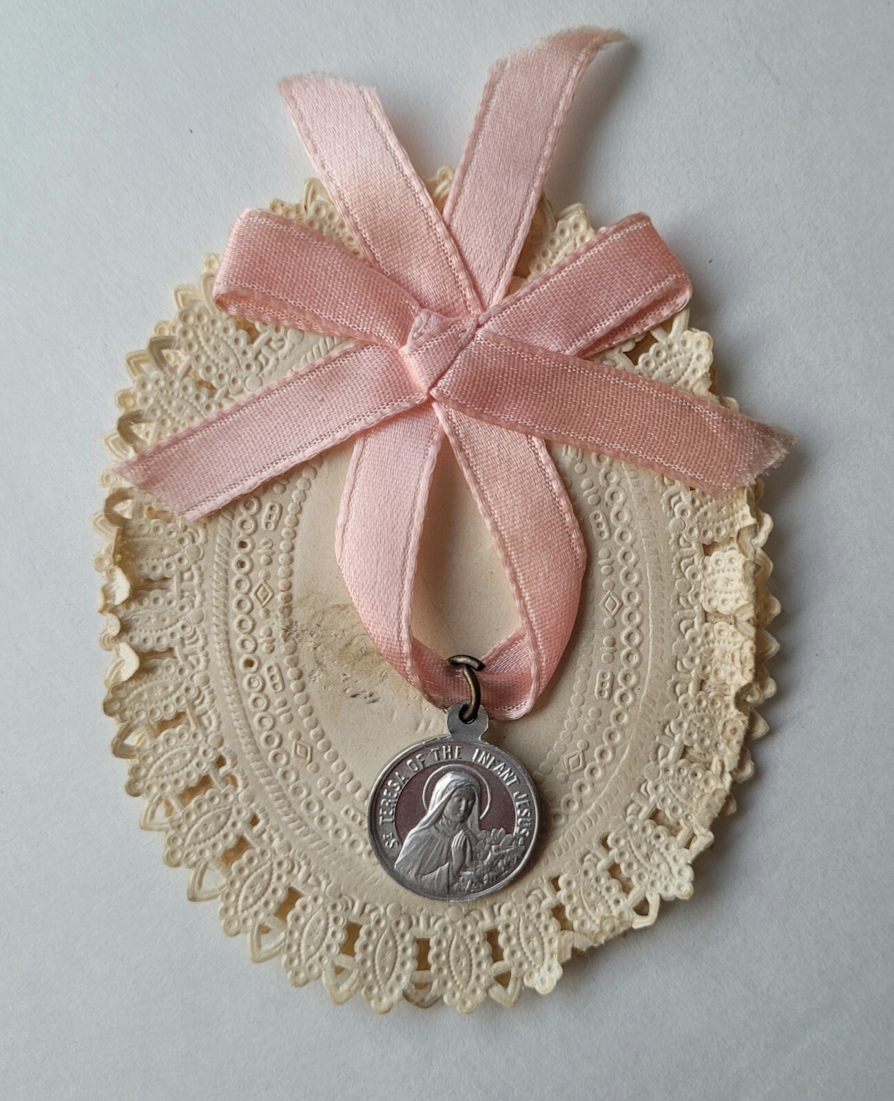 Vintage St Teresa Of The Infant Jesus Medal Pink Bow Ornate Doily Made in France