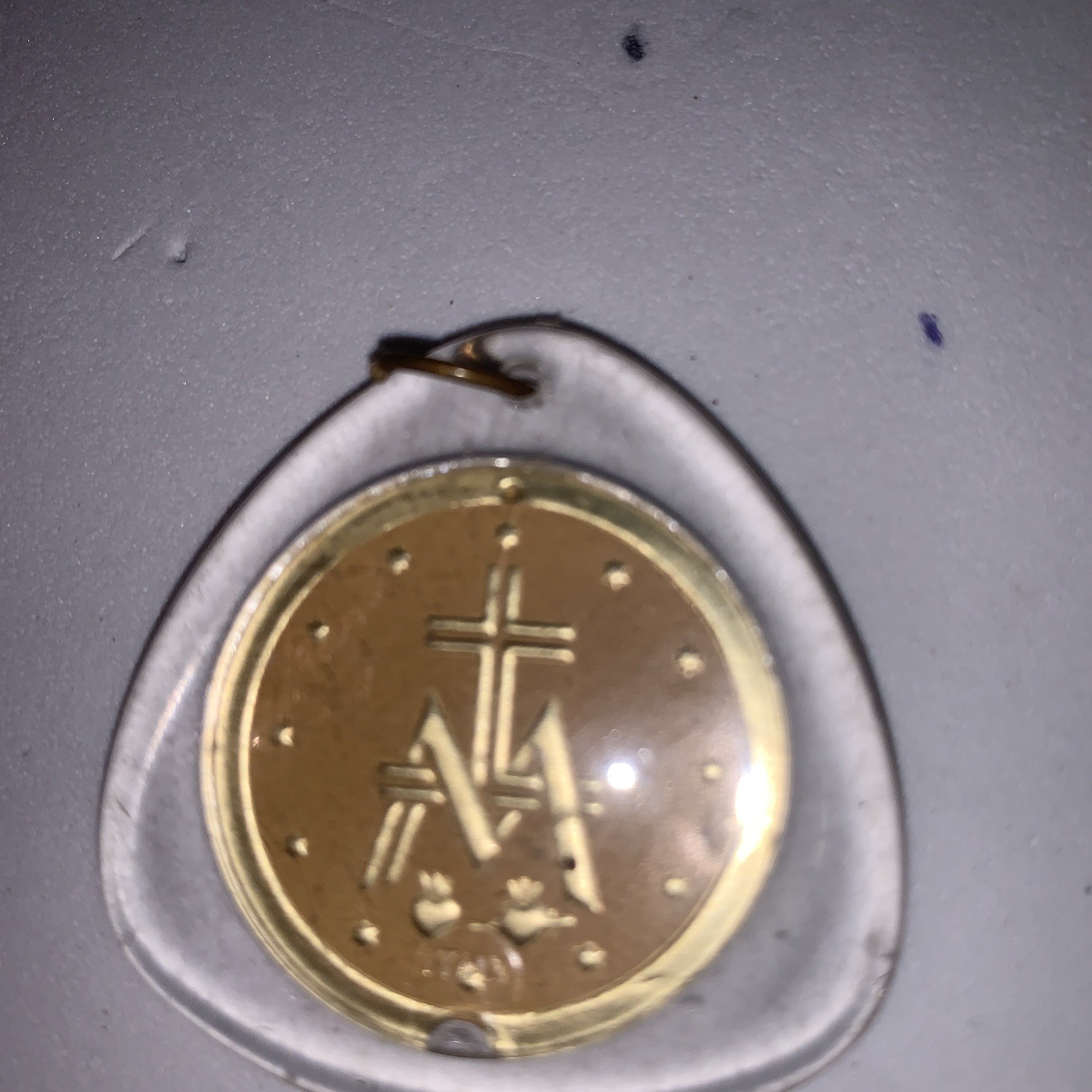 Italy Gold Pendant/medallion of St Mary encased in Plastic( Bail)