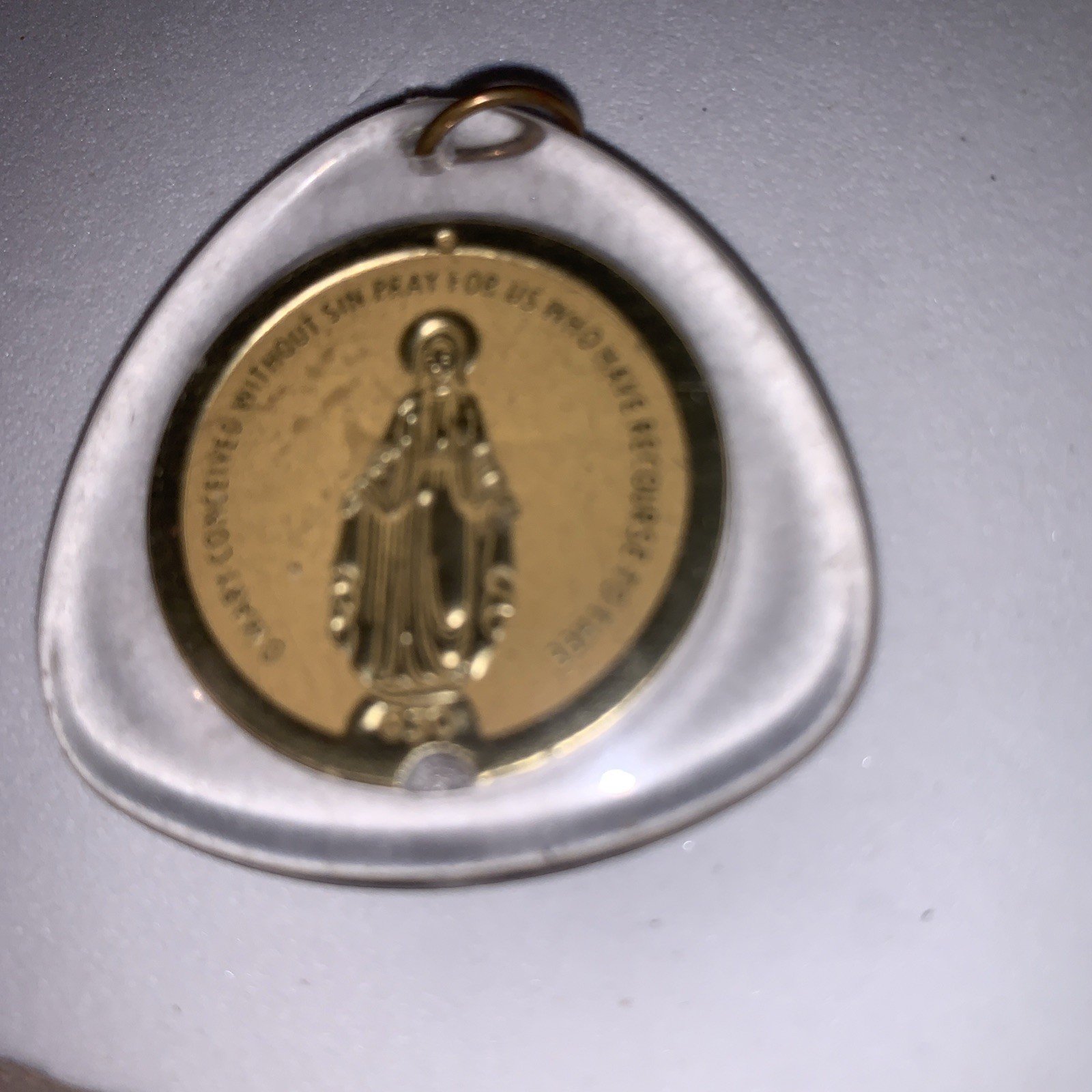 Italy Gold Pendant/medallion of St Mary encased in Plastic( Bail)