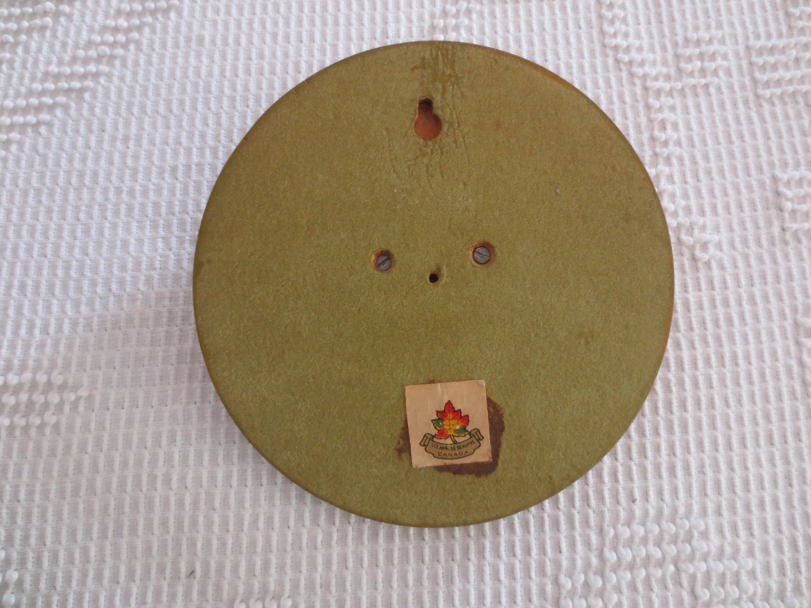 Vtg. Ste. Anne de Beaupre Metal JESUS CRUCIFIED HEAD on Wood PLAQUE–7-1/4″ Dia.
