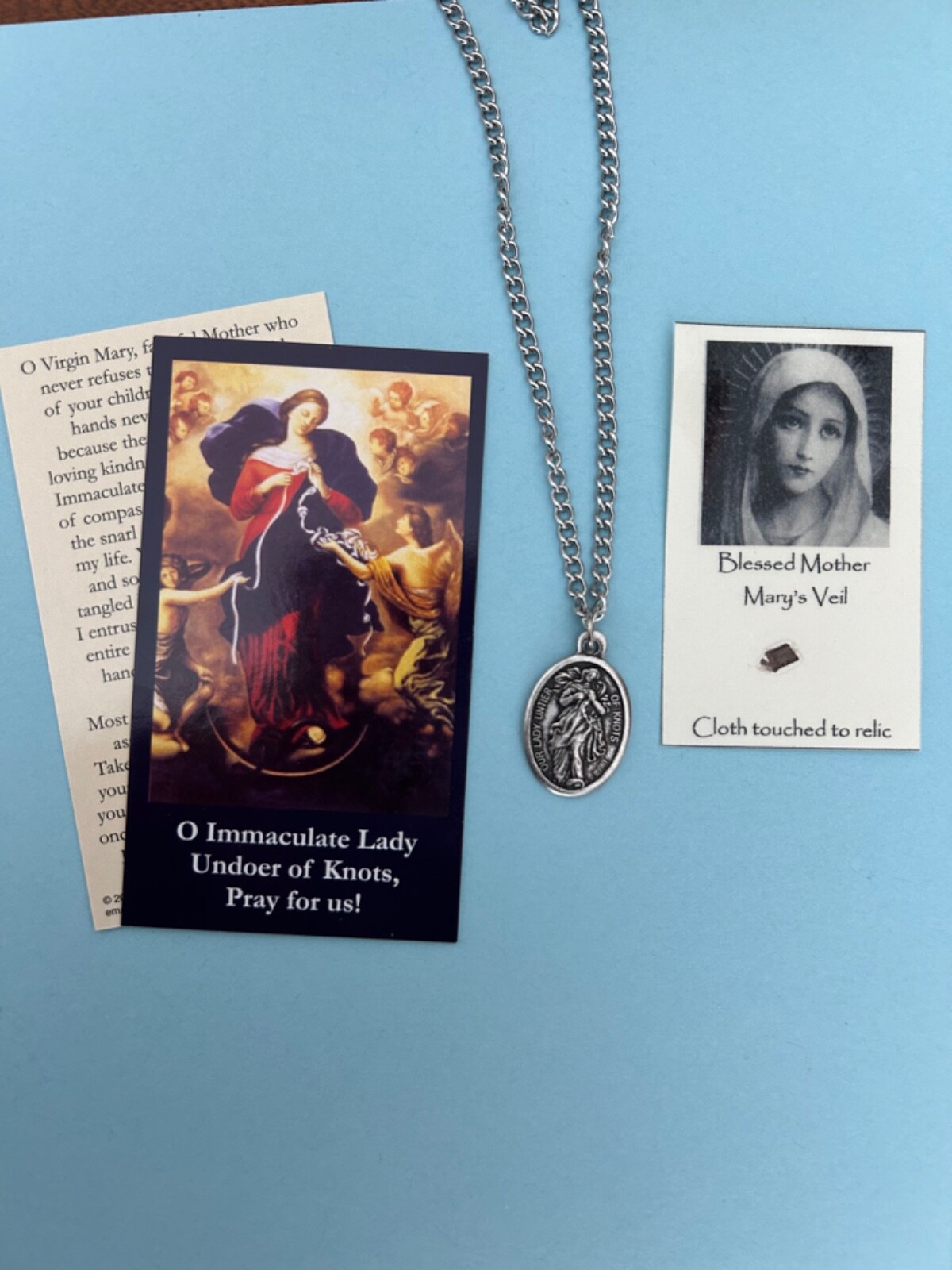Catholic Saint medal Our Lady Undoer of Knots Holy card relic St Blessed Mother