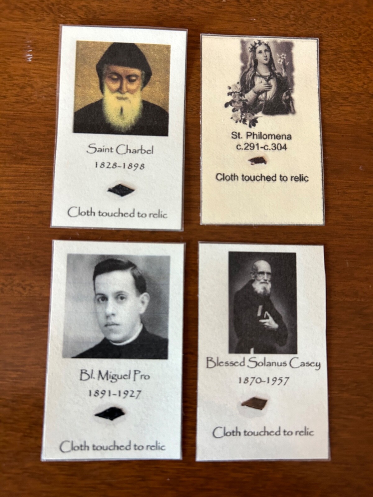 Catholic Saints homemade relic Holy card St Charbel Miguel Pro Solanus Philomena