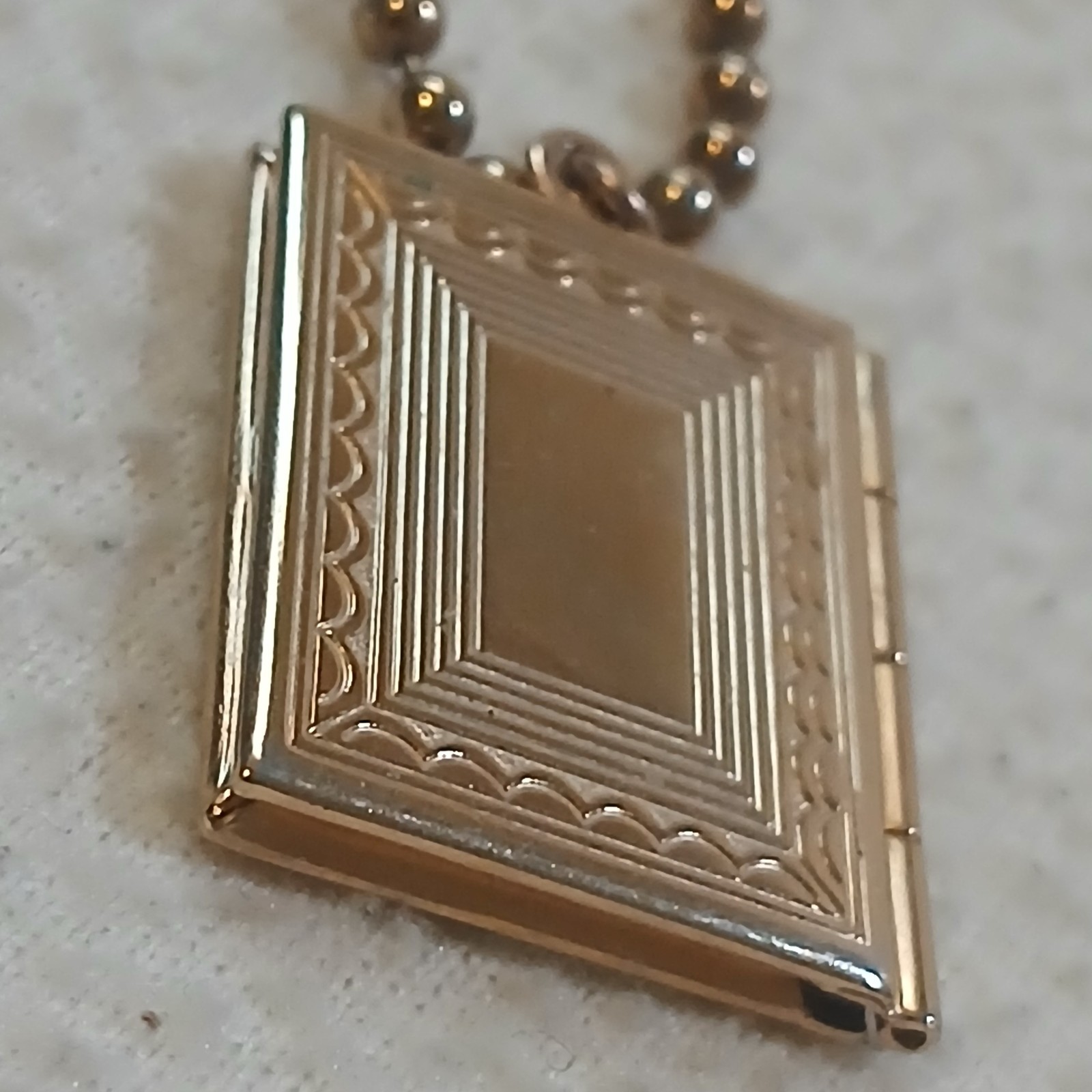 Locket Gold Toned Elevated Cross Medal Vintage Great Condition