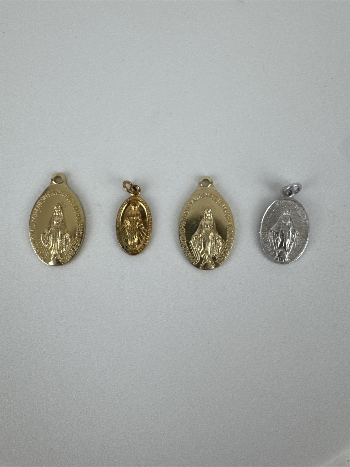 Lot of 4 Vintage Oval-Shaped Gold-Toned Miraculous Depiction Religious Pendant