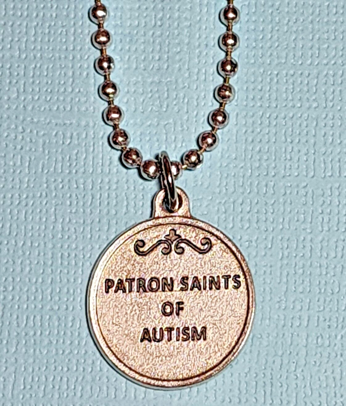 St. Dymphna & St. Nicholas Medal – Patron Saints of Autism On A Ball Chain 26″